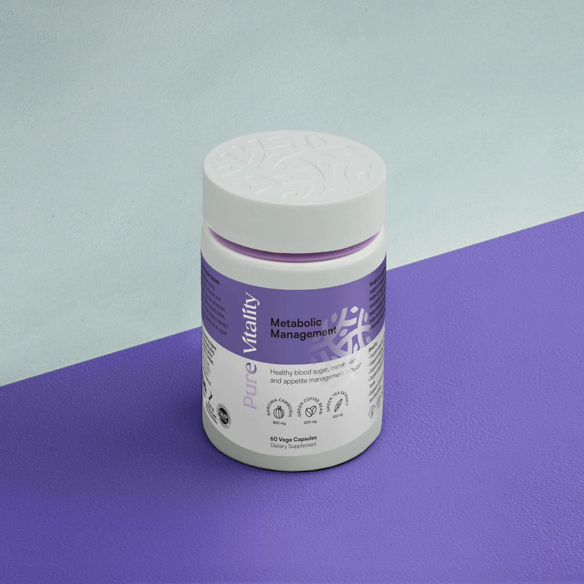 Top down image of the bottle of Metabolic Management 60caps against a white and purple background