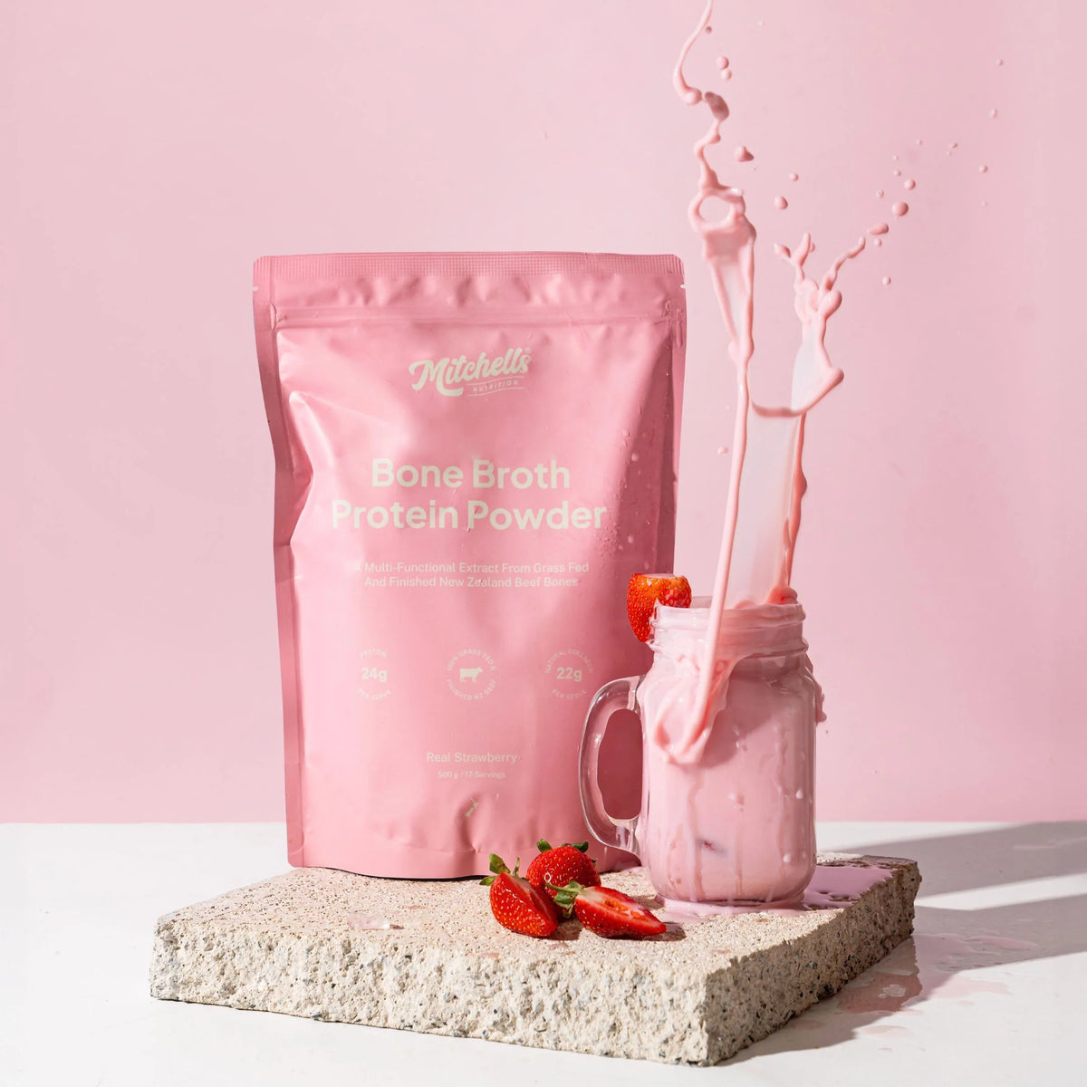 Image of Bone Broth Protein Strawberry Powder 500g made into drink
