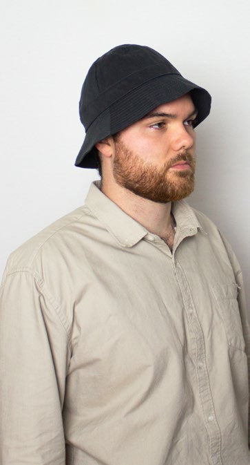 Male Model wearing Unisex Bucket Hat Bolton Navy