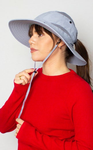 Female model wearing the Unisex Hat Greyson in Grey