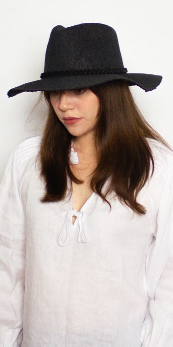 female model wearing Unisex Hat Regis Black