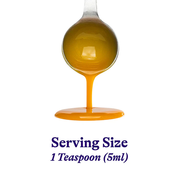 Spoon with yellow liquid and text indicating serving size on a white background