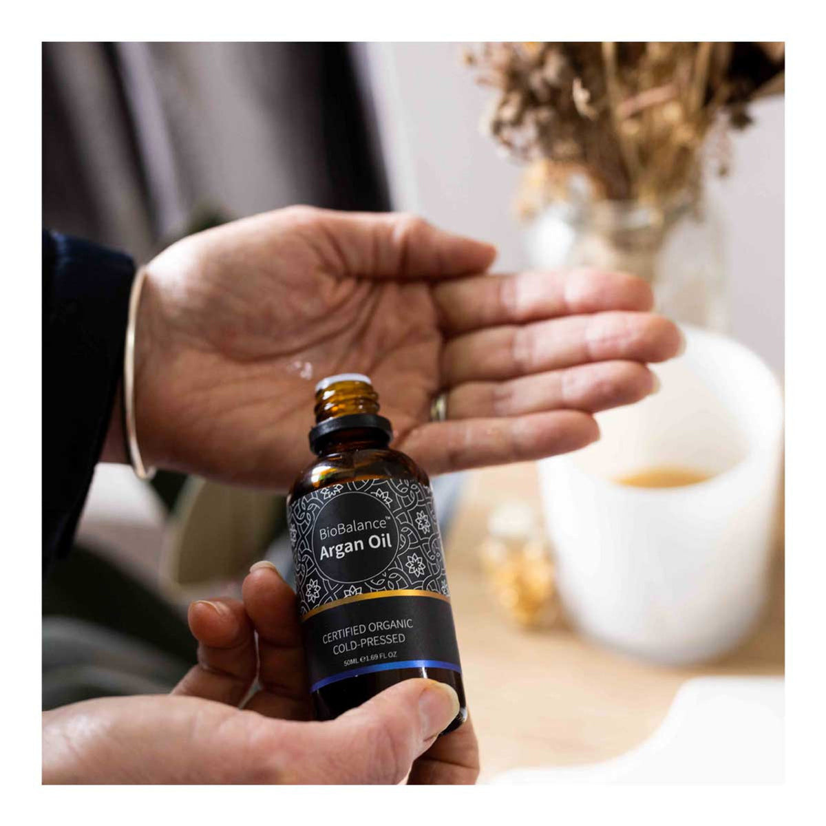 Image of Argan Oil poured into hand