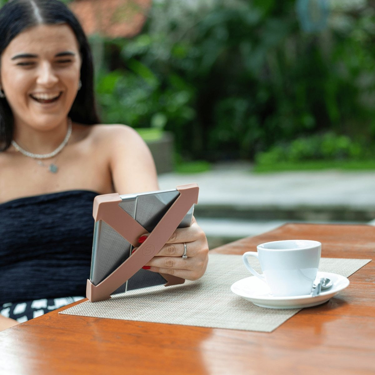 Strapsicle straps in Caramel in use while reading