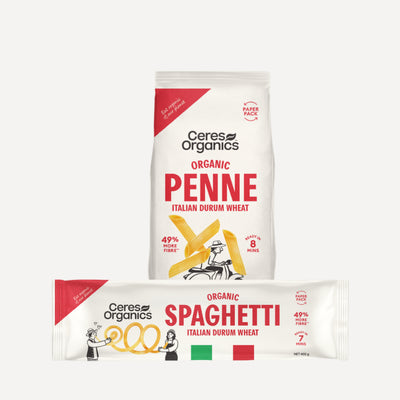 Ceres Organics Organic Durum Wheat Penne 400g bag standing behind a 400g pack of Organic Durum Wheat Spaghetti lying flat