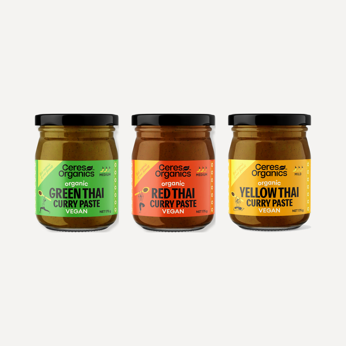 The three Thai curry paste jars in the bundle shown separately, green, red and yellow