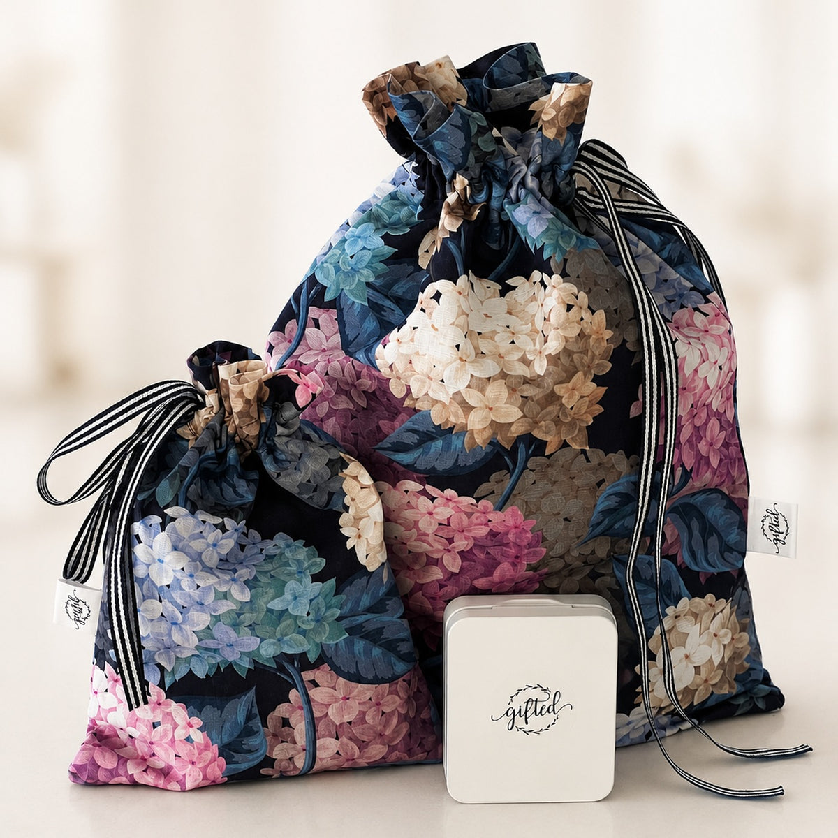 Blue and Pink Hydrangeas handmade fabric gift bag by Gifted With Love, shown in all three sizes