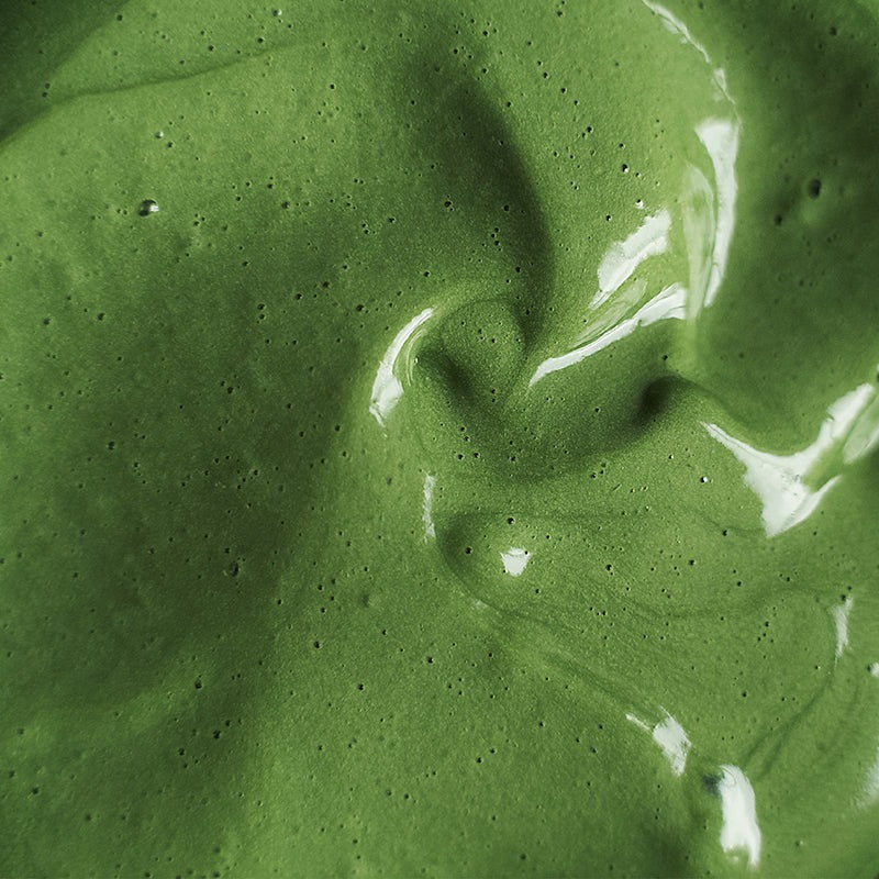 Close-up of the green, creamy texture of Hair Gain Hair Mask