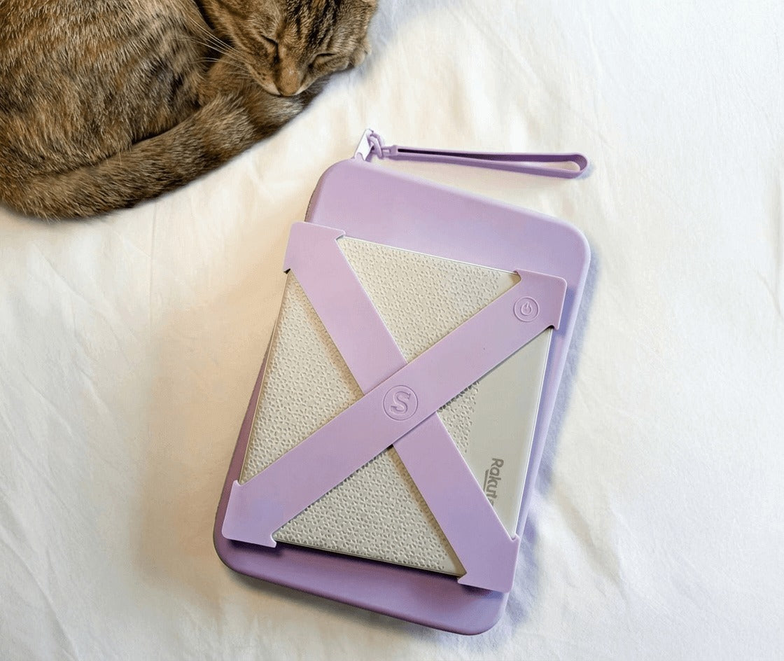 The Strapsicle Clutch in Lilac in use, another view
