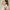 Image of woman holding Matte Sun Stick: Mugwort + Camelia 18g