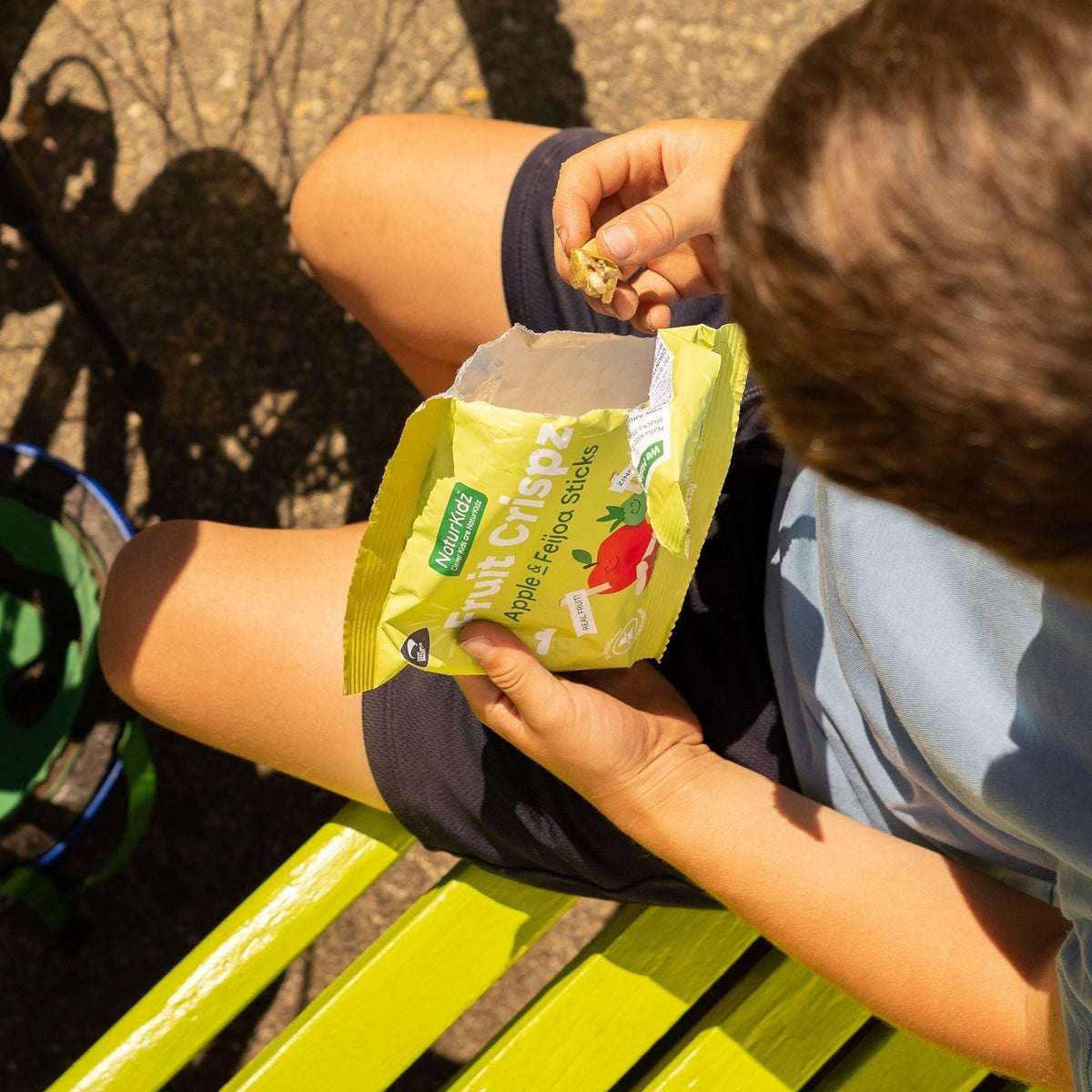 NaturKidz Fruit Crispz Apple & Feijoa Sticks, being eaten
