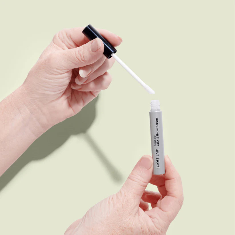 Image of Boost Lab lash and brown serum bottle