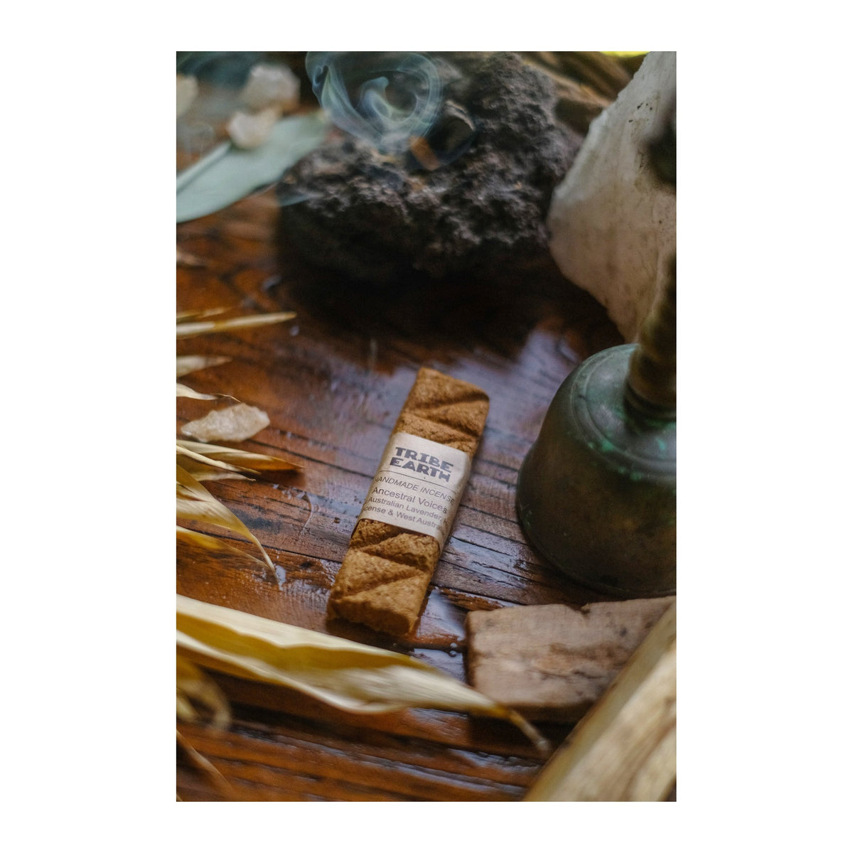 Ancestral Voices Incense Planks - Oak, Lavender & Frankincense incense burning, with the botanicals it is made from