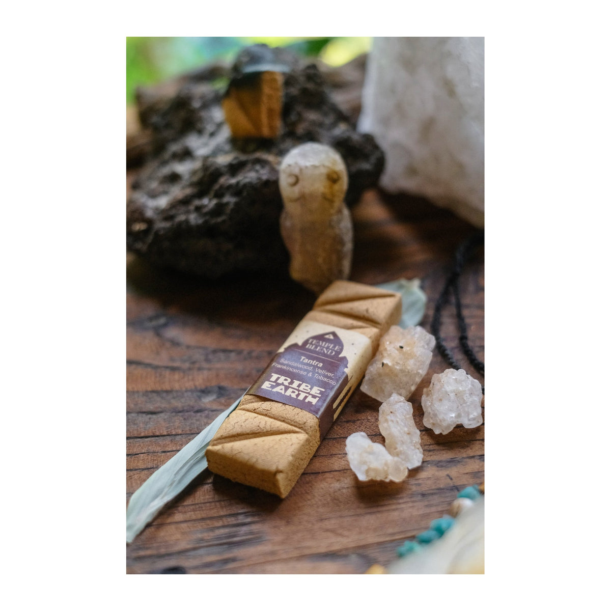 Tantra Incense Planks - Sandalwood, Vetiver, Frankincense & Tobacco incense burning, with the botanicals it is made from