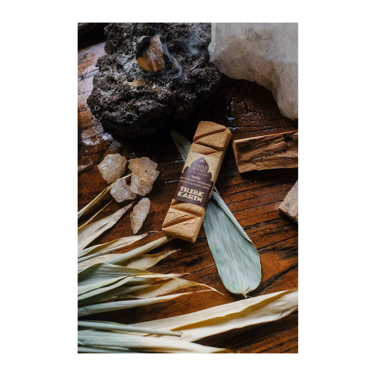 Vedic Incense Planks - Sandalwood, Vetiver & Ayurvedic Herbs incense burning, with the botanicals it is made from