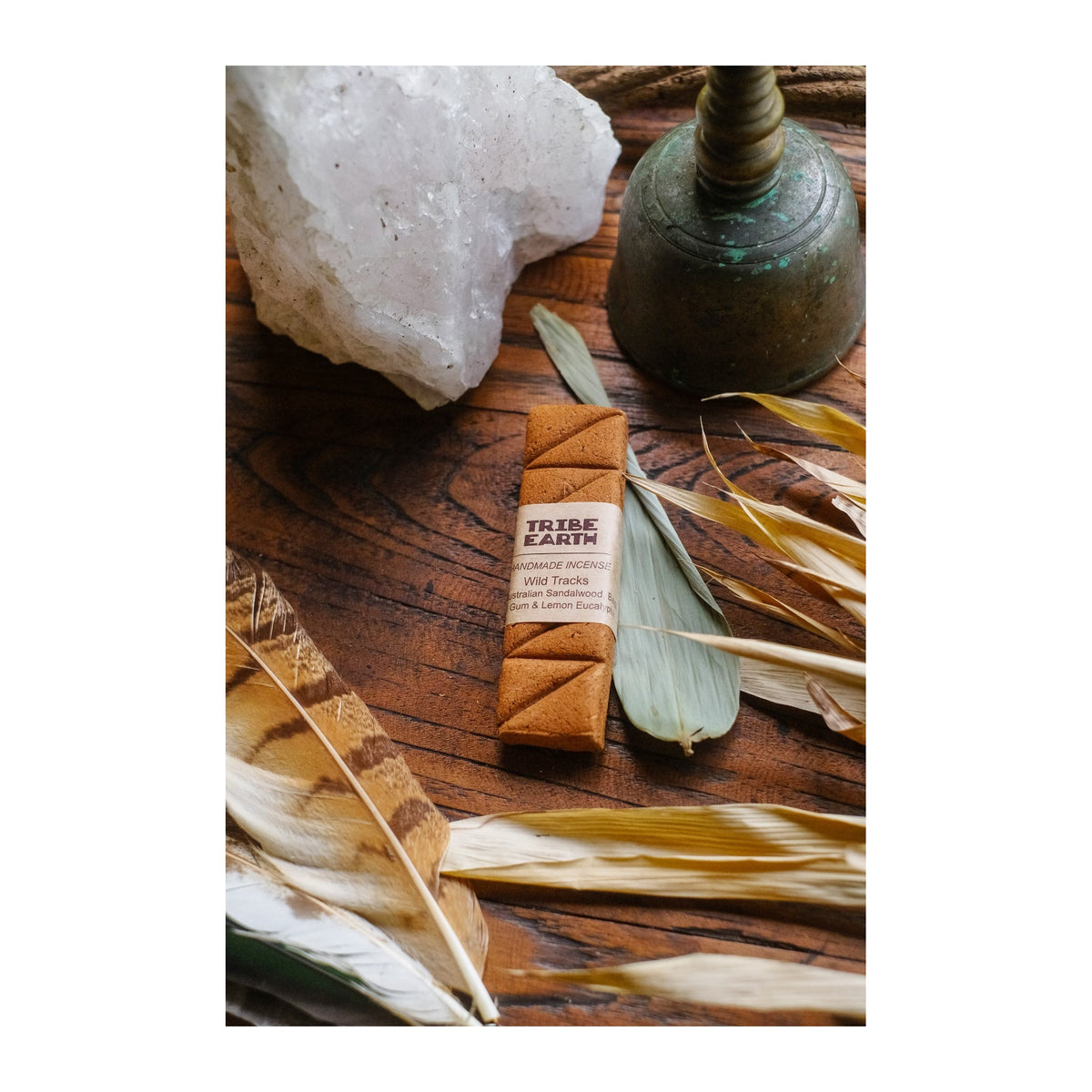 Wild Tracks Incense Planks - Sandalwood, Balga, Marri & Lemon Eucalyptus incense burning, with the botanicals it is made from