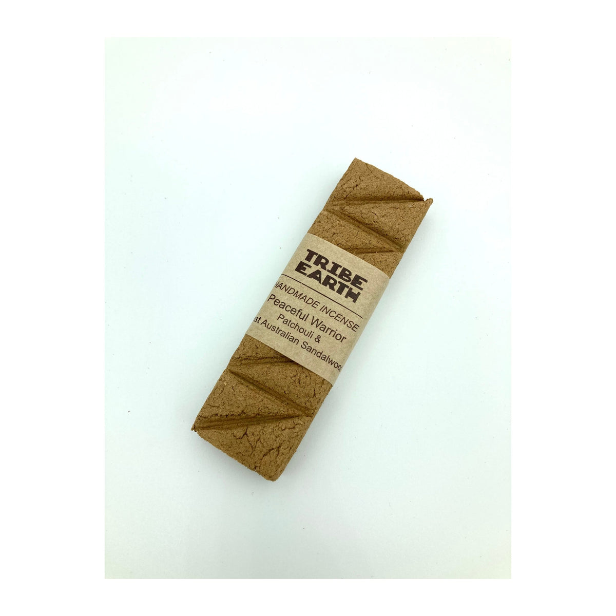 Peaceful Warrior Incense Planks - Sandalwood & Patchouli in its paper sleeve packaging