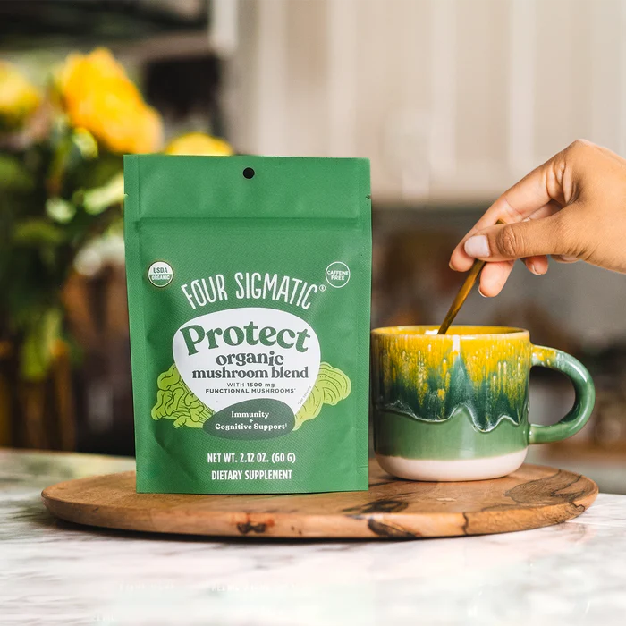 Image of Protect Organic Mushroom Blend 60g stirred into cup