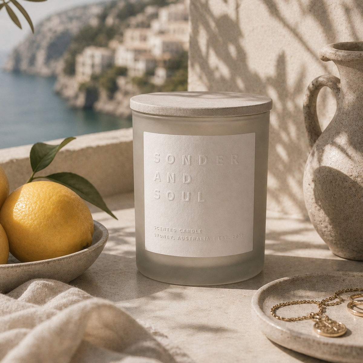 Amalfi Coast soy candle by Sonder and Soul, styled with the fragrance notes