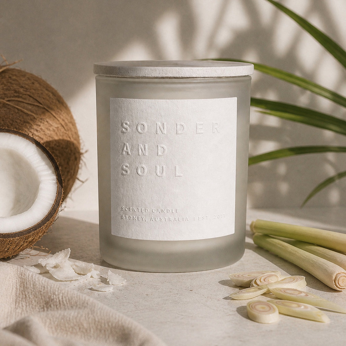 Coconut and Lemongrass soy candle by Sonder and Soul, styled with the fragrance notes