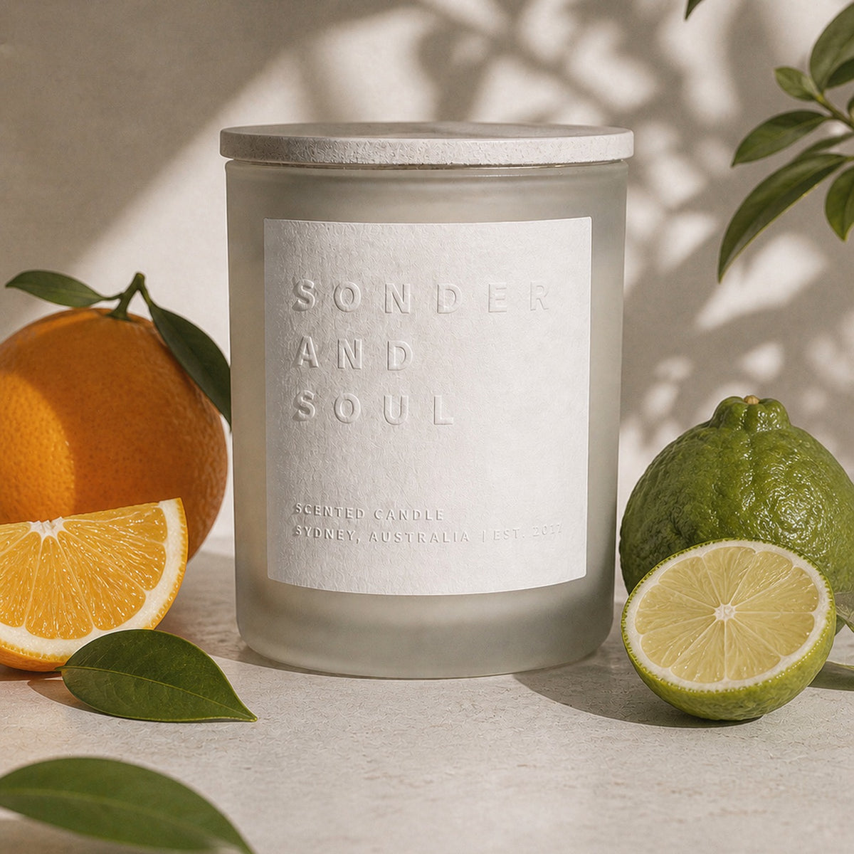 Orange + Bergamot soy candle by Sonder and Soul, styled with the fragrance notes