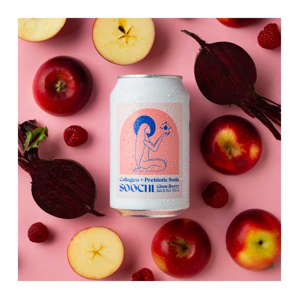 Soochi Glow Berry can photographed with fresh berries and apple